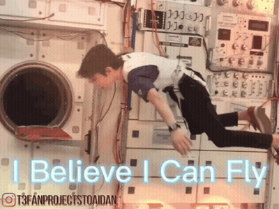 Group Of People Watching Runner On Track GIF