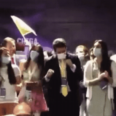 Group Of People Wearing Face Masks Dancing GIF