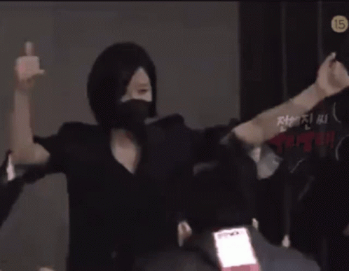 Group Of People Wearing Face Masks With Number 15 GIF