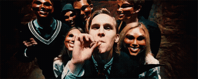 Group Of People Wearing Masks Posing GIF