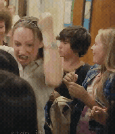 Group Of People With Hands In The Air GIF