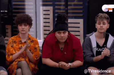 Group Of People With Hugo On Red Shirt GIF