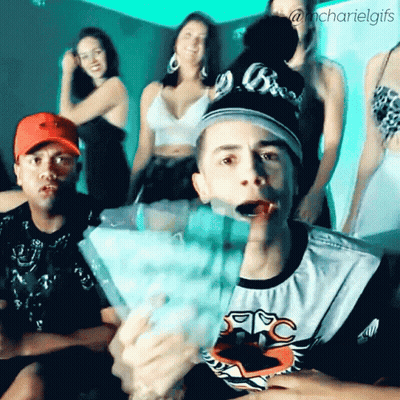 Group Of People With Man In MC Shirt GIF