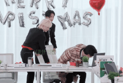 Group Of People With Merry Christmas Balloons GIF