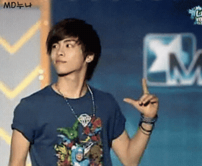 Group Of People With One Person Wearing Letter O GIF