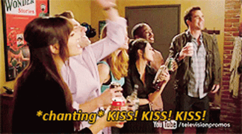 Group Of People With Text Chanting Kiss Kiss Kiss GIF