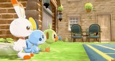 Group Of Pokemon In Front Of Brick Building GIF