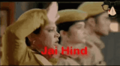 Group Of Police Officers Standing, One Holding Her Head GIF