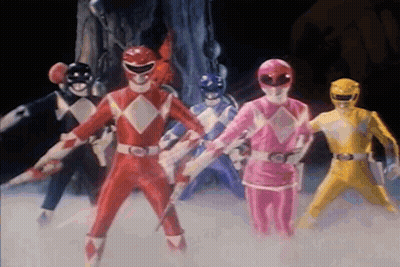Group Of Power Rangers Standing In A Line GIF