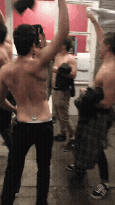 Group Of Shirtless Men Standing GIF