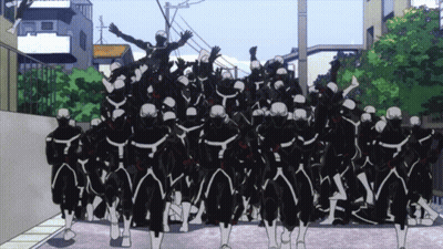 Group Of Skeletons Walking Down Street GIF
