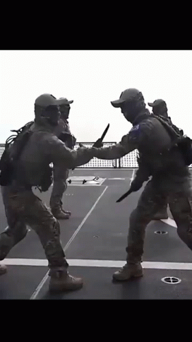 Group of Soldiers Holding Knives