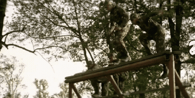 Group Of Soldiers Standing On Wooden Structure GIF