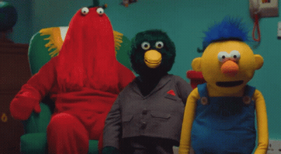 Group Of Stuffed Animals Red And Green Bird GIF
