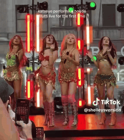 Group of Women Dancing in a Room