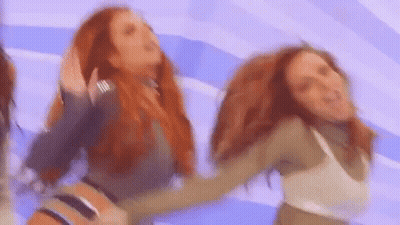Group Of Women Dancing On Purple Background GIF
