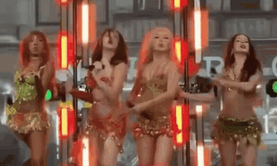 Group Of Women Dancing On Stage GIF