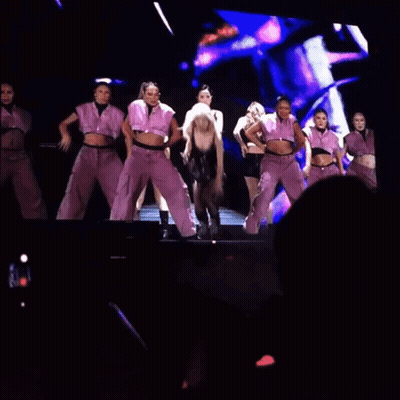 Group Of Women Dancing On Stage One Kneeling GIF