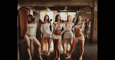 Group Of Women Dancing One In White Top GIF