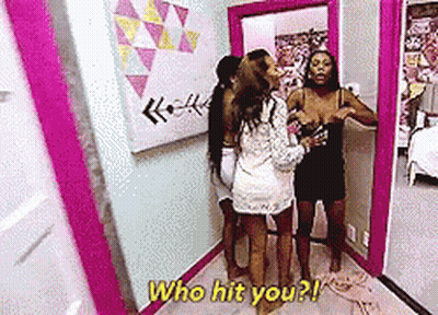 Group Of Women In Hallway Asking Who Hit You GIF