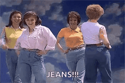 Group Of Women In Jeans Smiling GIF