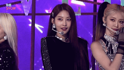 Group Of Women On Stage With Microphones GIF