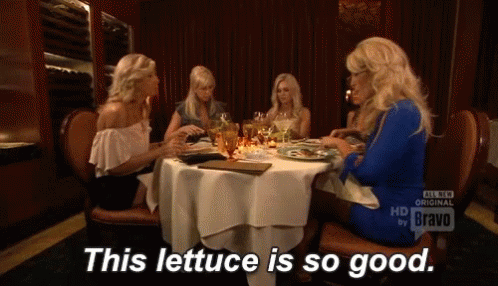 Group Of Women Sitting At Table Saying This Lettuce Is So Good GIF