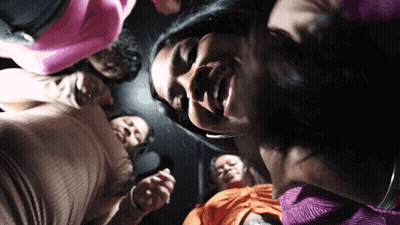 Group Of Women Sitting In Circle Looking Down GIF