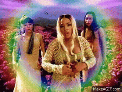 Group Of Women Standing In Front Of A Field Of Flowers GIF