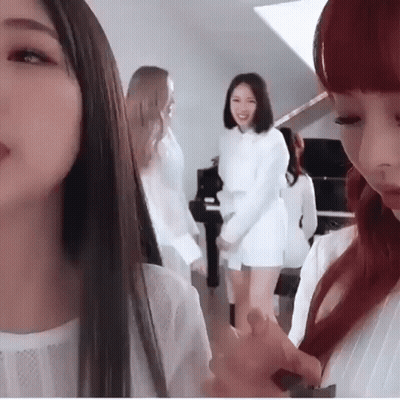 Group Of Women Standing In Front Of Piano GIF