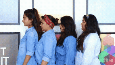 Group Of Women Standing In Front Of Wall Saying It GIF
