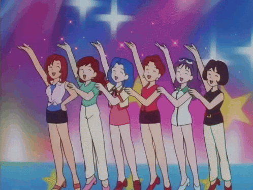 Group Of Women Standing With Arms In Air GIF