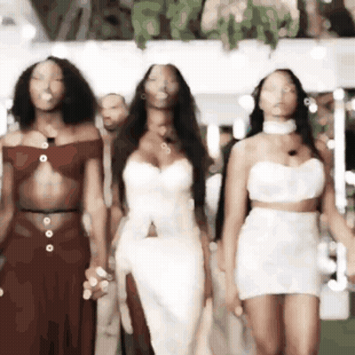 Group Of Women Walking On Runway GIF