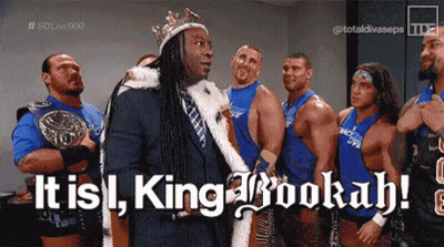 Group Of Wrestlers One Wearing King Crown GIF