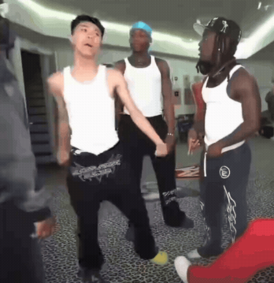 Group Of Young Men Dancing One In White Tank Top GIF