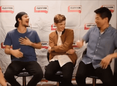 Group Of Young Men In Front Of Clevver Wall GIF