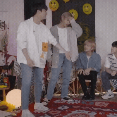 Group Of Young Men In Room With Balloons GIF