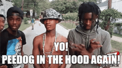Group Of Young Men On Sidewalk, One Wearing Hat GIF
