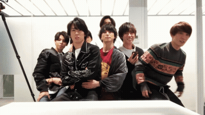 Group Of Young Men Posing In Front Of Mirror GIF