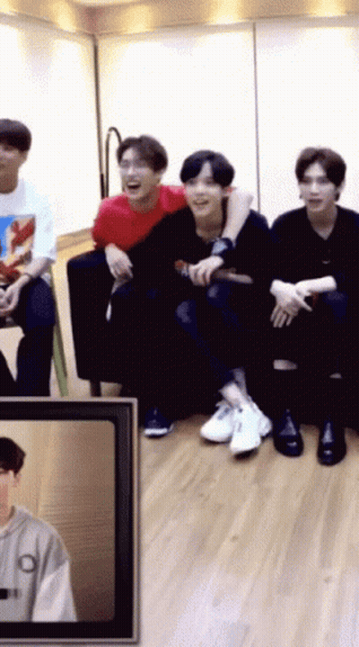 Group Of Young Men Sitting On Couch Laughing GIF