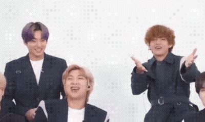 Group Of Young Men Sitting Together GIF