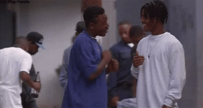 Group Of Young Men Standing In Crowd GIF
