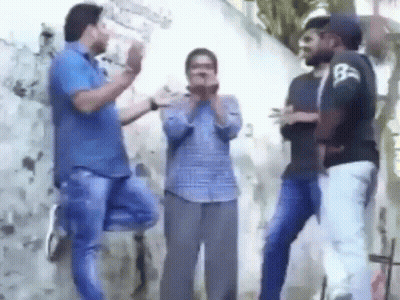 Group Of Young Men Standing In Front Of Wall GIF