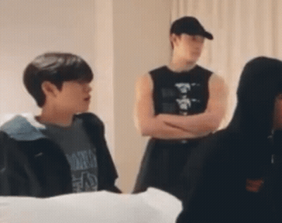 Group Of Young Men Standing In Room GIF