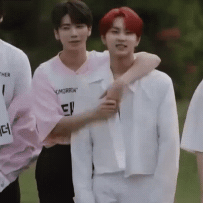 Group Of Young Men Standing Together GIF
