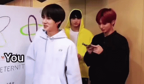 Group Of Young Men Standing Together GIF