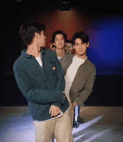 Group Of Young Men Standing Together GIF