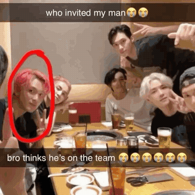 Group Of Young Men With Pink Hair At Table GIF