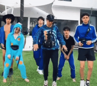 Group Of Young People In Grassy Field GIF