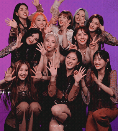 Group Of Young Women Posing On Purple Background GIF